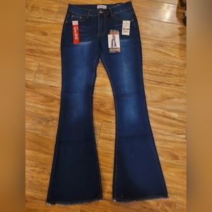 Red bottoms skinny flare jeans size 9 new with tags! Dark blue 32" inseam!
